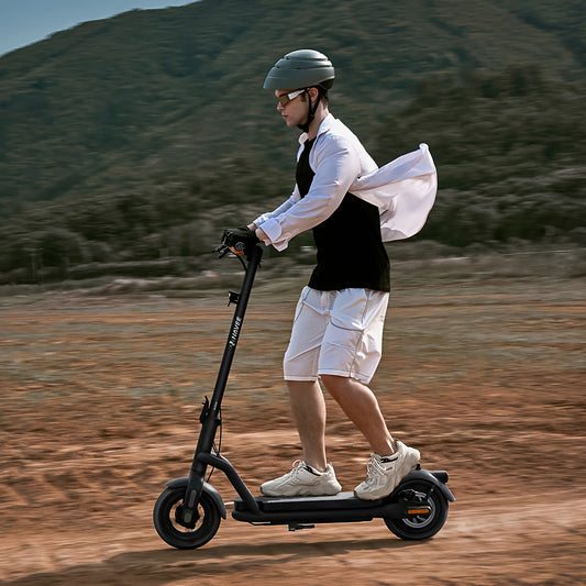 NAVEE N65I Electric Scooter for Adults, Featuring 10" Tires, a Foldable Design, App Control, And a Carbon Fiber Riser , Ideal for Black Friday And Christmas Presents